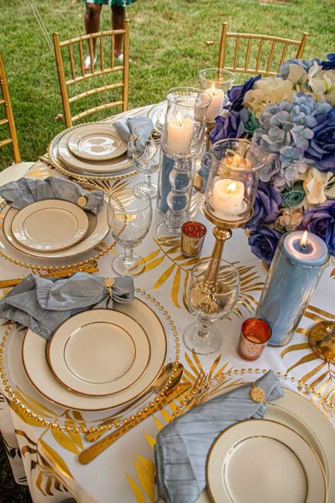 Blue White And Gold Tablescape, Powder Blue And Gold Wedding Theme, Debutante Ball Decorations Table Settings, Light Blue And Gold Table Setting, Blue And Yellow Sweet 16, Blue Themed 18th Birthday Party, Blue And Gold Themed Party, Blue Gold White Birthday Theme, Quinceanera Themes Yellow