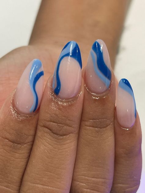 Blue Rounded Acrylic Nails, White Base Nails With Blue Design, Blue Nails No Acrylic, Blue Summery Nails, Nails With Waves, Birthday Nails Almond Blue, Gel Nail Designs Blue And White, Blue Nails For Graduation, Light Blue Oval Nails Design