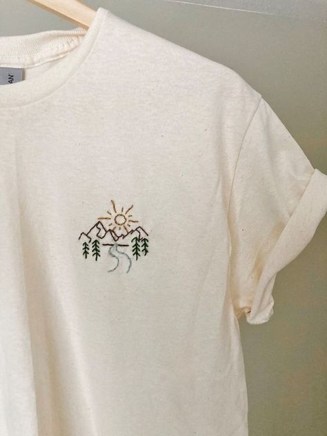 SUNRISE Tshirt Embroidery Design / Sun Rising Over Mountains Embroidered Landscape / Nature Lover Gift / the Great Outdoorsy Gift Men Women - Etsy Canada T shirt #tshirt t-shirt #t_shirt t shirts #tshirts t-shirts #t_shirts T shirt design #tshirtdesign T-shirt designs #t_shirtdesign T shirts designs #tshirtsdesigns 6.254 Cute Shirt Embroidery Ideas, Mountain Embroidery Tshirt, Unisex Embroidery Designs, Outdoorsy Tshirt Design, Diy Shirt Embroidery Ideas, Tshirt With Embroidery, Embroidered Tshirt Mens, Mens Embroidered Sweatshirt, Embroidery Ideas For Clothes