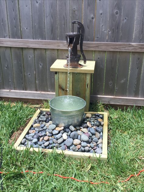 Water well hand pump, fountain basin, beach rocks and a milk bucket. 3rd fountain in my small back yard. Water Pump Ideas, Well Pump Cover, Zen Water Fountain, Diy Water Pump, Hand Pump Well, Garden Water Pump, Old Water Pumps, Pump Fountain, Well Covers