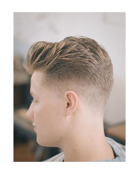 The taper fade mohawk is an excellent choice for a subtle, yet sharp appearance. Semi Mohawk, Long Hair Mohawk, Taper Fade Mohawk, Mohawk Hairstyles For Men, Mohawk Cut, Short Hair Mohawk, Fade Mohawk, Short Mohawk, Mohawk Haircut