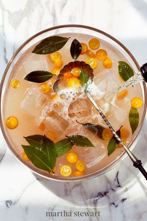 Filled with seasonal ingredients and prepared for a large crowd, we can't think of a better big-batch cocktail for New Year's Eve than this one. It's sparkling, sweet, and totally spectacular. #marthastewart #recipes #recipeideas #holidaypartyfoods #newyearfoods #cocktailpartyrecipes Cooler Recipes, Sangria Summer, Sparkling Punch, Batch Cocktail Recipe, Citrus Punch, New Years Cocktails, Summer Punch, White Cranberry Juice, Batch Cocktails