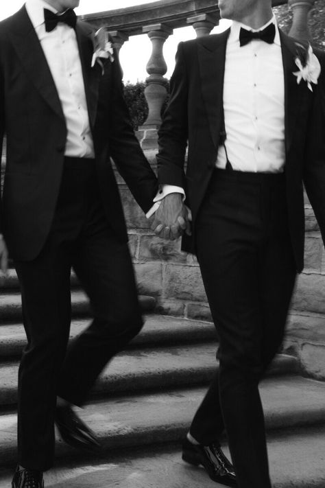 motion photo of gay couple in tuxes walking down stairs hand in hand Wedding Tux Aesthetic, Mlm Wedding, Gay Wedding Suits, Gay Wedding Aesthetic, Wedding Party Aesthetic, Gay Engagement Photos, Lgbt Engagement Photos, Gay Couple Wedding Photo Ideas, Gay Wedding Ideas