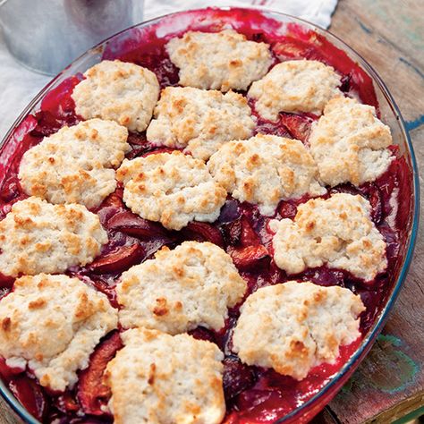 This juicy plum cobbler is topped with rich cream cheese biscuits. Plum Cobbler, Cream Cheese Biscuits, Fresh Fruit Desserts, Plum Recipes, Apple Brandy, Fruit Cobbler, Cheese Biscuits, Cobbler Recipes, Juicy Fruit