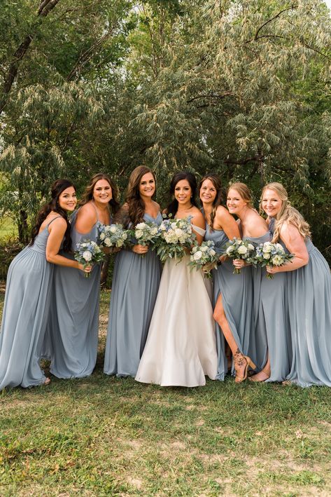 Dusty Blue Bridesmaid Dress Photos with the bride. Bridesmaid bouquets with dusty blue and white flowers. #dustybluewedding #dustybluebridesmaiddresses #FortCollinsWedding Bridesmaid Dress Blue Dusty, Dudty Blue Bridesmaids Dresses, Powder Blue Wedding Theme Bridesmaid Dresses, Dusty Blue Chiffon Bridesmaid Dress, Duty Blue Bridesmaid Dresses, Blue Bridesmaid Dresses Dusty Blue, Dusty Blue Bridesmaid Dresses Fall, Silk Dusty Blue Bridesmaid Dresses, Safe And Blue Wedding