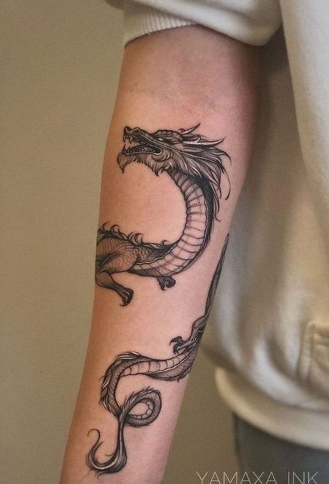 Latest 50 Dragon Tattoo Designs, their Meaning and Patterns Dragon Tattoo Around Arm, Dragon Tattoo Wrapped Around Arm, Dragon Tattoo Forearm, Dragon Tattoo Leg, Dragon Tattoo Arm, Wrap Around Tattoo, Around Arm Tattoo, Dragon Sleeve Tattoos, Dragon Tattoo For Women