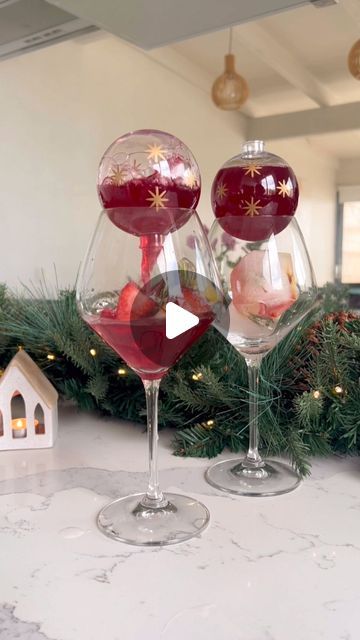 Chantel Mila Ibbotson on Instagram: "You need to save this simple Christmas cocktail recipe for your next holiday gathering 🎄🍸 it’s so easy to recreate and will impress your guests every time ♥️ full recipe below:  1. Make ice cubes with lemon, strawberries and mint or rosemary  2. Mix 1 cup cranberry juice, 1 tbs lime juice and optionally 1 part vodka and triple sec  3. Serve in a clear bauble over ice  Allow your guests to turn over the bauble to let the drink flow into the glass - so much fun! Will you be trying this one? 🎄♥️  #christmascountdown #christmas #christmas2022 #christmascocktails #christmascocktail #easyrecipes #easyrecipe #christmasdecor #christmasdecorations #christmasjoy #festiveseason #mamamilastips" Christmas Bulb Drink, Christmas Ice Cubes, Chantel Mila, Christmas Cocktails Easy, Christmas Cocktail, Christmas Cocktails Recipes, Christmas Cocktails, Triple Sec, Cranberry Juice