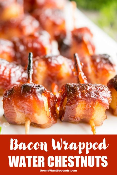 These Bacon Wrapped Water Chestnuts are a crispy, crunchy nibbler destined for greatness on your next buffet table. A nostalgic cocktail classic that will have everyone raving!#Bacon #BaconWrapped #WaterChestnut #Salty #Parties #Water #FingerFoods #Holidays #Families #Sweets #Meals #Appetizer #Sauce #Ketchup #Worcestershire #BrownSugar #Party #Buffet #Classic #Cocktail #Canned #Rumaki Rumaki Recipe Bacon Wrapped Appetizers, Waterchestnut Recipes Appetizers, Rumaki Recipe Bacon Wrapped, Bacon Wrapped Water Chestnuts Appetizers, Rumaki Recipe, Bacon Wrapped Water Chestnuts Recipe, Waterchestnut Recipes, Bacon Wrapped Water Chestnuts, Individual Appetizers