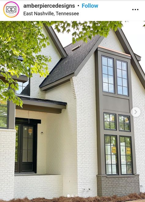 White House With Painted Brick, Cream Brick Black Windows, Black Windows Brown Trim, Neutral Outside House Colors, Painted Cream Brick House, Mushroom Colored House Exterior, Urban Bronze Trim Exterior Colors, Cream Color Home Exterior, Alabaster White And Iron Ore Exterior