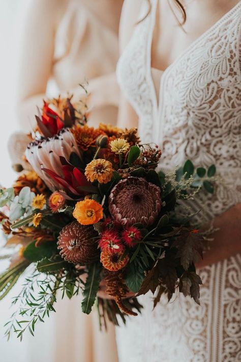 Autumnal bouquet of proteas, banksias, zinnias, leucadendrons for a Bellarine Peninsula Wedding. Photo by: Love Wilder Australian Native Wedding, Autumnal Bouquet, Native Bouquet, Native Wedding, Rustic Beach Wedding, Protea Flower, Australian Flowers, Australian Native Flowers, Bouquet Inspiration