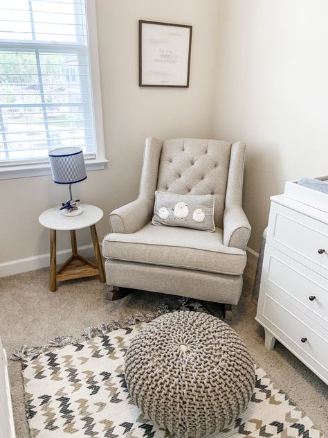 White and tan neutral nursery, gray rocking chair, lamb pillow , airplane lamp, pouf ottoman from home goods, side table from target, for this child I have prayed wood framed canvas wall decor from hobby lobby, dressed from pottery barn the extra wide Marlow dresser Rocking Chair Side Table, Rocking Chair Corner Nursery, Gray Rocking Chair Nursery, Rocking Chair Side Table Nursery, Rocking Chairs For Nursery, Nursery Chair Corner, Nursery Side Table Ideas, Nursery Chair Ideas, Neutral Nursery Gray