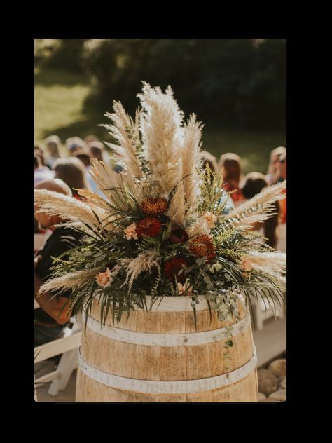 Western Floral Arrangements Wedding, Western Wedding Florals, Boho Barrel Flowers, Western Flower Arrangements, Diy Western Flower Arrangement, Rustic Flower Arrangements Wedding Whiskey Barrels, Large Wedding Flower Arrangements Wine Barrels, Western Event, Ceremony Decorations Outdoor