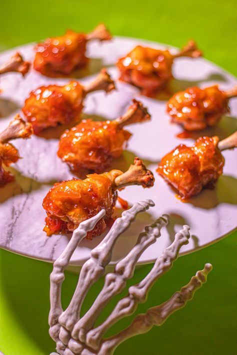 Halloween Chicken Wings, Skeleton Snacks, Chicken Wing Appetizers, Wing Appetizers, Halloween Food Photography, Halloween Ribs, Orange Marmalade Sauce, Dinner Plating, Wings Oven Baked