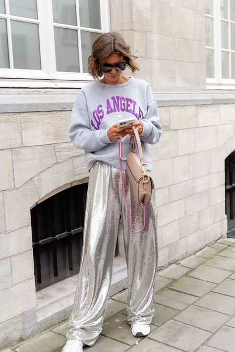 Explore Spring Style 2024: Parisian Chic to Casual Street Looks Silver Pants Outfit, Street Mode, Long Black Sweater, Silver Pants, Look Boho Chic, Parisienne Chic, High Street Fashion, Moda Paris, Power Dressing