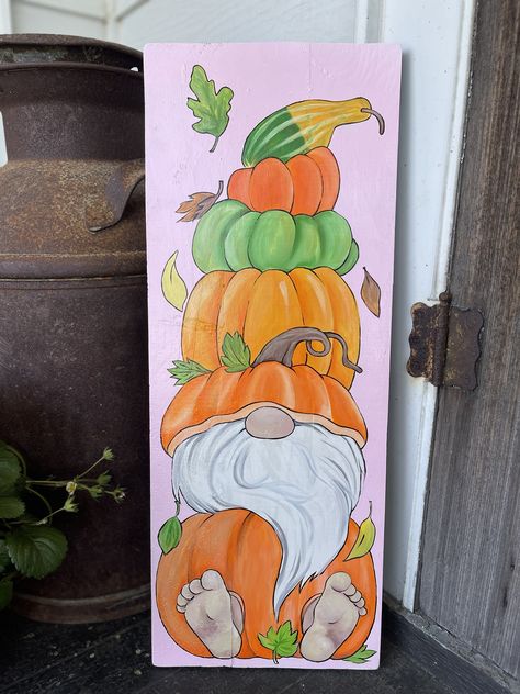 I’ve made so many of these reversible gnome paintings!! All different seasons. Gnome sign | Hand painted | Fall decor | Pumpkins | dual-purpose decor Fall Gnomes Painting, Gnome Wood Sign, Gnome Paintings, Gnome Signs, Pumpkin Canvas Painting, Dog Paw Print Art, Fall Decor Pumpkins, Paw Print Art, Decor Pumpkins