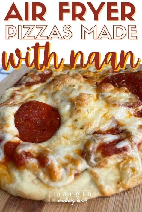 Learn how to make easy pizzas in the air fryer using naan bread! This is a great shortcut and makes a simple lunch or dinner idea. Air Fryer Naan Pizza Recipes, Air Fry Naan Pizza, Nan Bread Pizza Air Fryer, Naan Bread In Air Fryer, Airfryer Naan Pizza, Naan Rounds Recipes, Naan Bread Pizza Air Fryer, Air Fryer Pita Pizza, Naan Bread Meals