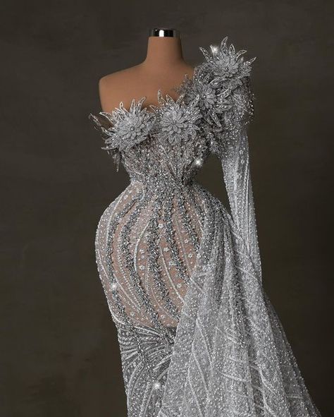 BLINI FASHION HOUSE on Instagram: "Get ready to steal the show in this darling bridal gown, embellished with shimmering crystal flowers and stones that will make heads spin! 💫👰🏼‍♀️  #bride #bridetobe #bridaldress #weddingdress #bride2024" Luxurious Dresses With Crystal Embellishments For Prom Season, Glamorous Crystal-embellished Gown For Prom Season, Luxury Crystal-embellished Dresses For Prom Season, Luxury Crystal-embellished Gown For Party Season, Prom Dresses Silver, Wedding Reception Dress For Bride, Silver Crystal-embellished Evening Dress For Weddings, Md Dresses, Dress With Crystals