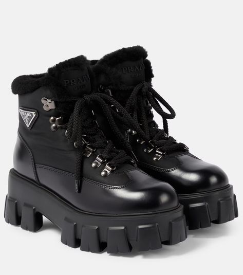 Monolith leather combat boots in black - Prada | Mytheresa Prada Monolith Boots, Prada Boots, Mid Heel Ankle Boots, Leather Combat Boots, Italian Heritage, Triangle Logo, Prada Shoes, Mid Heel, Heeled Ankle Boots