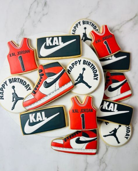 Let's make their first birthday a slam dunk! Order custom cookies that are perfect for your little one's theme!⁠ ⁠ ⁠ ⁠ ⁠ #dallascookies #dallasbaker #greatonecookies #decoratedcookies #dallascustomcookies #edibleart #cookieart #corporategifting #royalicingcookies #dfwcookies #dfwcustomcookies #dallaseventplanner #dallascookiecake #customcookiecake #shoecookies #nike #nikecookies #sportscookies #basketballcookies #firstbirthdaytheme #firstbirthdaycookies #marchmadness Nike First Birthday Theme, Jordan 1 Birthday Theme, First Kickback Birthday Theme, Nike Theme Party Birthdays, Nike Themed Party Ideas, Nike Cookies, Nike Birthday Party Ideas, Nike Birthday, Bday Cookies