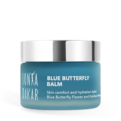 Sonya Dakar's Blue Butterfly Balm provides instant relief and radiant glow to dry, rough, or irritated skin. Packed with highly potent extracts of the Blue Butterfly Pea Flower and 20 other botanicals, this luxuriously rich balm melts into your skin, activating its calming aroma and skin-soothing properties. Sonya Dakar, Blue Butterfly Pea Flower, Kalahari Melon, Baobab Oil, Beauty Glazed, Skin Care Quiz, Butterfly Pea Flower, Blue Tansy, Geranium Oil