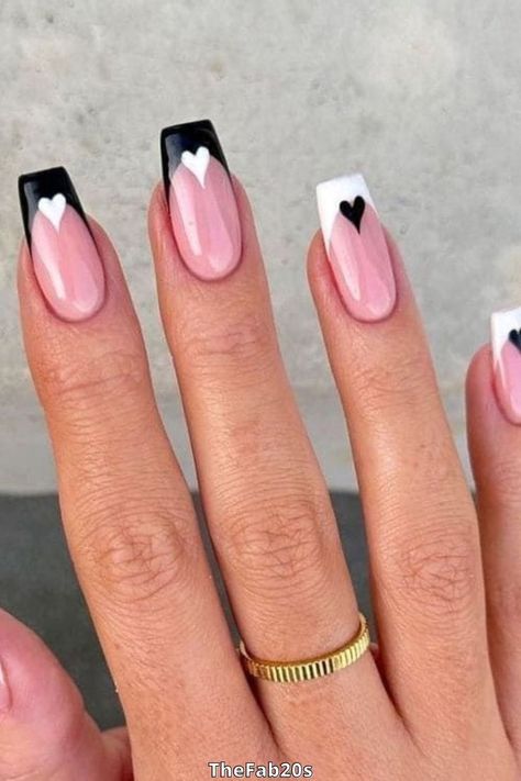 Make a statement with black and white nails! Our collection features 51+ bold and striking designs, including stripes, polka dots, and geometric patterns. Whether you prefer a classic or edgy look, we've got you covered. Browse our selection now for the perfect black and white nail design! Ballerina Nails Designs, Feather Nails, White Tip Nails, Ballerina Nails, Black Nail, White Nail, Fabulous Nails, French Tip Nails, Valentine's Day Nails