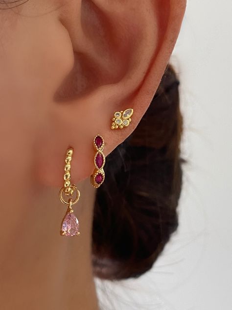 This gorgeous set comes with • 1 pair of Pink CZ dangle earrings with 15mm (or 12mm princess hoops)- Material: 18K gold plated on 925 sterling silver, AAAAA Cubic Zirconia • 1 pair of Pink Marquise hoops - Material: 18K gold plated on Brass, Cubic Zirconia • 1 pair of Gold stud earrings - Material: 8K gold plated on 925 sterling silver, AAAAA Cubic Zirconia • 1 Anett Gift Box HypoallergenicNickel free and Lead free Pink And Gold Earring Stack, Pink Princess Makeup Looks, Gold And Pink Earrings, Cute Earring Stacks, Earring Stacks Gold, Pretty Ear Piercings, Princess Earrings, Colored Earrings, Pretty Jewelry Necklaces