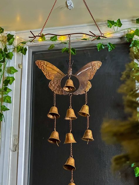 Butterfly with Bells Wind Chime Enjoy the song of lovely bells each time a breeze blows. Our Flamed Butterfly Wind Chimes feature a lovely, sculpted profile, plus soft, iridescent colors that catch the light without overpowering the senses. Nine diminutive bells cascade throughout the piece, provide a pleasing sound. Like other Happy Gardens wind chimes, this set has been individually handcrafted, and will bring lasting beauty to your patio, porch, or garden. 9 bells Dimensions: 10.5” L x 1.5” W Aesthetic Wind Chimes, Cool Wind Chimes, Enchanted Home Decor, Windchimes Aesthetic, Wind Chimes Aesthetic, Windchimes Outdoor, Bug Decor, Trinkets Decor, Bell Wind Chimes