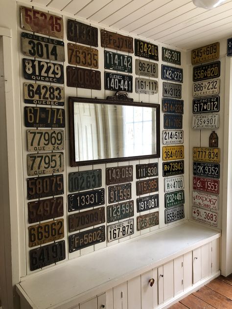 Old license plate display Antique License Plates Ideas, Display Old License Plates, License Plate Wall Decor Ideas, License Plate On Wall, Vintage License Plates Decor Wall Art, Decorating With License Plates, License Plate Bedroom Decor, License Plate Wall Art, Display License Plates