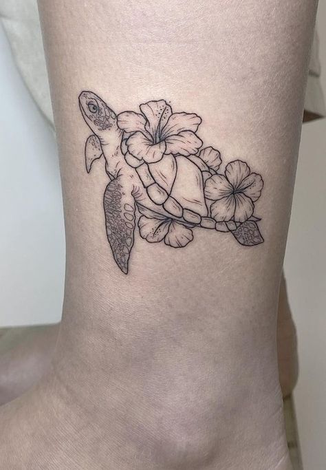 Hibiscus Tattoos: Meanings, Tattoo Styles & Ideas Plumeria Turtle Tattoo, Cute Hawaii Tattoos, Hawaii Style Tattoo, Tropical Tattoo Ideas For Women, Hibiscus Tattoo For Men, Tattoo Ideas Hawaiian For Women, Hibiscus Vine Tattoo, Hibiscus And Lily Tattoo, Tattoo Ideas Female Hibiscus