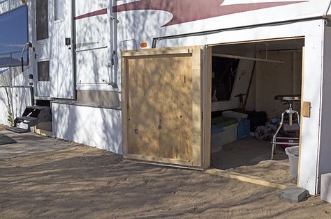 You wouldn’t normally think of a 5th wheel trailer as a tiny house, but when I was invited over to Matt and Kathleen’s Forest River Cardinal trailer which is parked behind a friend’s home, I was astounded at how cozy and “house-like” it felt. The couple, who downsized from their home in Seattle to this … Patio Coverings On A Budget, 5th Wheel Living, Rv Skirting, Fifth Wheel Living, 5th Wheel Camper, Fifth Wheel Campers, Tiny House Blog, Camper Storage, Trailer Living