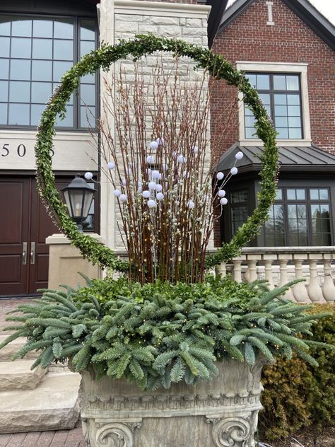 Lighted Steel Hoops | Dirt Simple Unusual Garden Ornaments, Deborah Silver, Winter Arrangements, Winter Planter, Garden Works, Winter Centerpieces, Christmas Planters, Garden Designer, Rope Lights