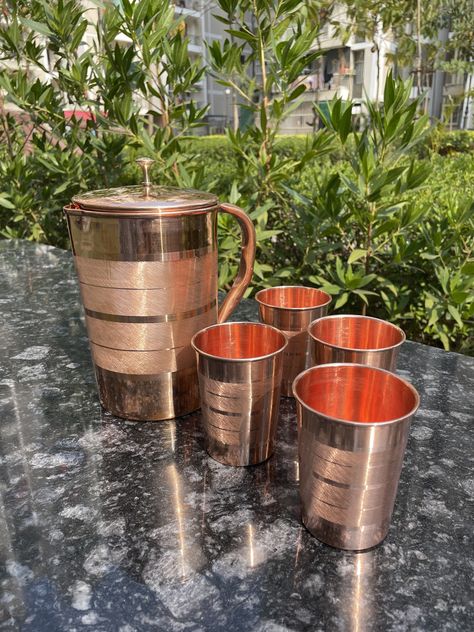 Elevate your hydration game with our Pure Copper Water Jug with Tumblers! Crafted for those who value both style and health, this set is a must-have for any eco-conscious household. Join the movement towards sustainable living today. #CopperWaterJug #HealthyLifestyle #EcoFriendlyLiving #SustainableChoices #DrinkPure #StayHydrated Ecommerce Store, Eco Friendly Living, Water Jug, The Movement, Eco Conscious, Pure Copper, Sustainable Living, Tumbler, Copper