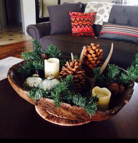 Large wooden rustic bowl from #Goodwill filled with greens and ornaments for the holidays. #thrift #decor #nature Large Wooden Bowl Decor Ideas, Wooden Bowls Centerpiece, Antler Christmas Decor, Wood Bowl Centerpiece, Wooden Bowls Decor, Thrift Decor, Dough Bowl Centerpiece, Wood Bowl Decor, Large Decorative Bowl