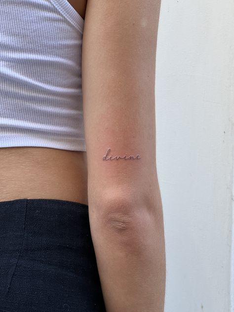 Writing On Back Of Arm Tattoo, Dainty Tattoo Words, Small Word Tattoos For Women Arm, Back Arm Word Tattoo, Dainty Tattoos Writing, Dainty Feminine Tattoos Arm, The Word Delicate Tattoo, Fineline Tattoo Script, Small Signature Tattoo