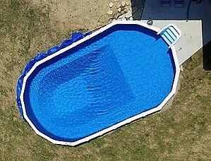 royal-swimming-above-ground-pool-with-deep-end In Ground Doughboy Pool, Above Ground Pool With Deep End, Oval Above Ground Pool Ideas, Semi Above Ground Pool, Doughboy Pool, Porch Vibes, Oval Above Ground Pools, Oval Pool, Pool Deck Plans