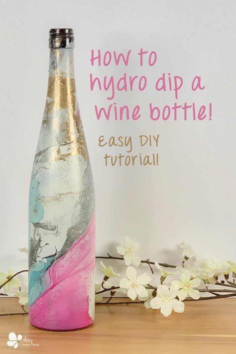 These are so much fun to do! Make these hydro dipped bottles in 4 simple steps, with only a few materials. Create beautiful patterns on glass bottle to decorate your space with. #artsyprettyplants #diydecor #diydecorating #homedecor #easycrafts Spray Painted Wine Bottles, Liquor Bottle Lights, Paint Dipping, Liquor Bottle Crafts, Painted Glass Bottles, Hydro Dipping, Glass Bottle Diy, Diy Glass Bottle Crafts, Wine Bottle Art