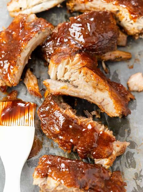 This Slow Cooker Pork Rib Recipe is so easy to make and starts with a flavorful dry rub. From there it's brushed with Dijon mustard, BBQ sauce, and cooked in a Crock Pot with chicken broth, onions, and garlic. Look no further for the BEST rib recipe! #SlowCookerRecipes #PorkRecipes #CrockPotRecipes #SundayDinnerIdeas Easy Pork Ribs, Slow Roasted Ribs, Best Ribs Recipe, Slow Cooker Pork Ribs, Bbq Meatloaf, Cozy Cook, Crockpot Ribs, Rib Recipe, Slow Cooker Ribs