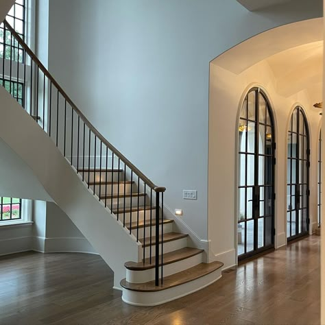 This week getting settled in.. still waiting on several pieces of furniture to arrive, and need to purchase a couple more. I have an art… | Instagram Suburban Staircase, Luxury Home Inspiration, Curved Staircase Foyer, House With Stairs, Staircases Ideas, Old Money Interior Design, Old Money Interior, Classy House, Hidden Staircase