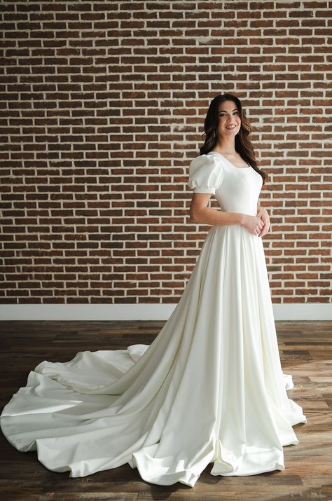 "She's beautiful"- Bashful. Margene's has a beautiful selection of dresses that make your Disney dreams come true! Modest Wedding Dresses Mermaid, Elegant Wedding Dress Modest, Modest Bride Dress, Modest Wedding Dress Mermaid, Conservative Wedding Dress, Modest Wedding Dresses Lds, Modest Bridal Dresses, Modest Lace Wedding Dresses, Wedding Gown Accessories