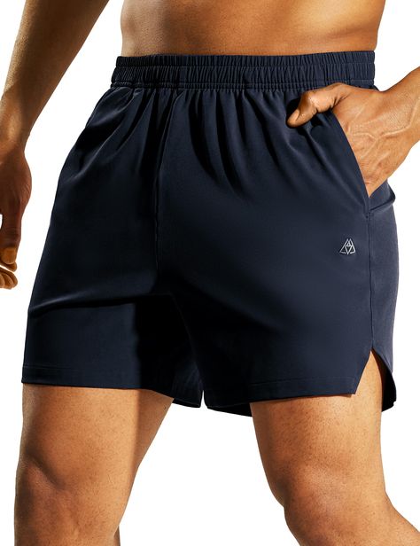 PRICES MAY VARY. Lightweight & Breathable Fabric: Mens 5" athletic running shorts without liner are made of lightweight and stretchy polyester for durability, with a DWR (durable water repellent) finish that sheds light moisture cool and dry 2 Pockets: Two deep side pockets can safely protect your phone or other valuables during athletic Split Hem Design: These lightweight, quick-drying athletic shorts have a split hem to keep you agile. Wear these Sweat-wicking, multi-sport shorts for pretty mu Fast Workouts, Running Shorts Men, Athletic Running, Running Workout, Active Wear Shorts, Active Shorts, Athletic Men, Gym Shorts, Workout Gym