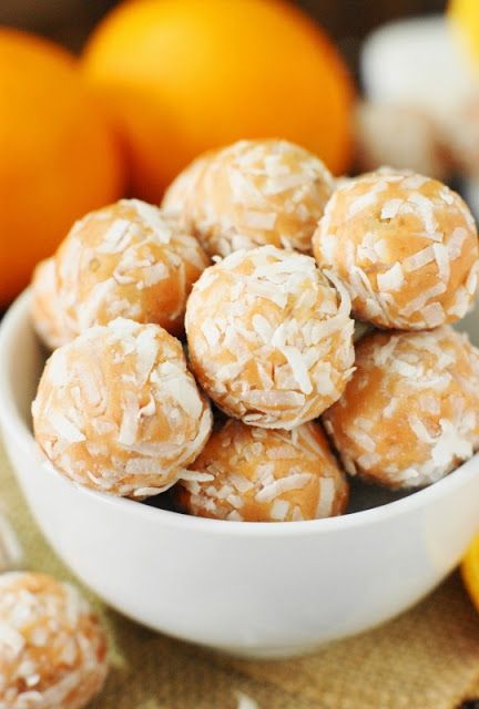 Orange-Coconut Balls ~ Orange lovers, these are for you!  Because these little bite-sized beauties pack a huge orange punch.   www.thekitchenismyplayground.com Eating Cookie, Chocolate Chip Cookie Dough Truffles, Truffle Balls, Orange Balls, Football Foods, Orange Punch, Cookie Dough To Eat, Coconut Truffles, Coconut Balls