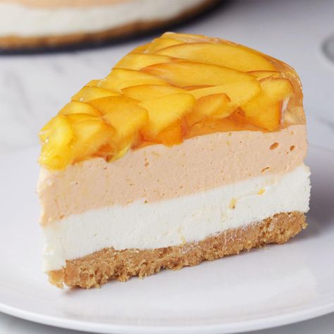 Delight friends and loved ones this summer with this beautiful Peaches ‘n’ Cream Cheesecake recipe. It may take a bit of time, but it’s relatively easy to prep and it is definitely worth the wow factor! Peach Cheesecake, Orange Food Coloring, Cream Cheesecake, Peaches And Cream, Cookie Crumbs, Peaches Cream, Peaches N Cream, Cheesecake Recipe, Savoury Cake