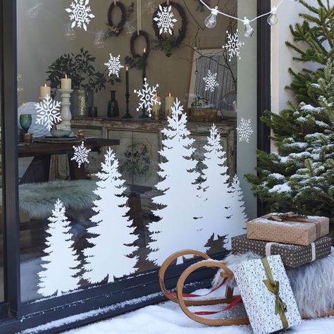 Set the scene for all to enjoy this with well-dressed windows. From stencilled designs to seasons greetings on bunting, it's all about windows in 2020 Business Window Christmas Decor, Holiday Window Decor, Window Silhouette Christmas, Wreath Window Decor, Window Christmas Decor Ideas, Winter Window Silhouette, Store Front Christmas Window Painting, Christmas Window Display 2022, Christmas Window Painting