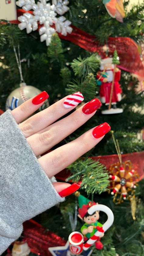 Candy Cane Design Nails, Square Holiday Nails, Coffin Candy Cane Nails, Long Nails Red, Red French Tip Santa Hat Nails, Christmas Nails French Tip Red Candy Canes, Candy Cane Stripe Nails, Red Nails With Candy Cane Ring Finger, Red Nails With Candy Cane Accent