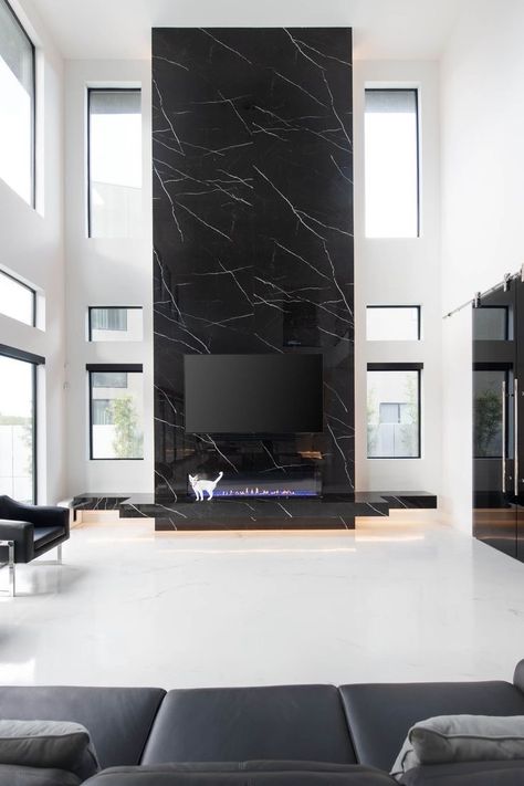 Black Marble Fireplace Wall, Black Marble Tile Fireplace, Two Storey Fireplace, Dark Fireplaces, Lakehouse Fireplace, Fancy Fireplace, Black Marble Fireplace, Modern Fireplace Ideas Living Rooms, Porter House