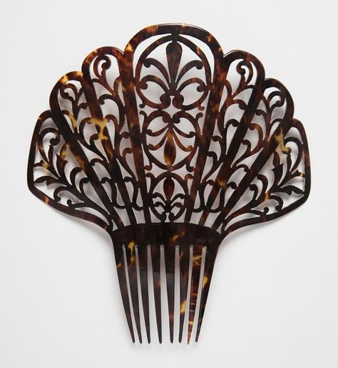 Ornate tortoiseshell combs called peinetas were brought to Spanish-held territories in the 18th century, and by the 19th century, they spread across Puerto Rico, Cuba, Mexico, Peru, Brazil and the southern-most region of South America. They became intricately designed and oversized, such as the peineta pictured here, which dates from 19th-century Cuba. Peinetas typically hold up mantillas, the lace or silk shawls that cover a woman’s head and shoulders, and they came to symbolize a woman’s ... Spanish Hairstyles, Flamenco Costume, 3d Pen Art, Antique Hair Combs, 19th Century Clothing, Art Deco Hair, The Descendants, Head And Shoulders, Vase Crafts