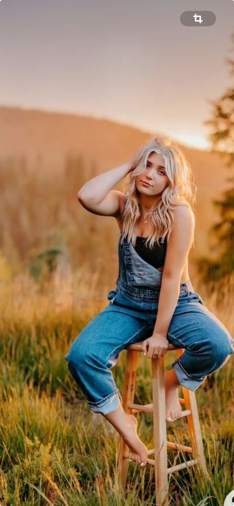 Senior Pictures With Overalls, Stool Picture Poses, Field Chair Photoshoot, Senior Picture Ideas Stool, Senior Picture Chair Poses, Senior Field Photos, Stool In Field Photoshoot, Stool Photoshoot Photo Ideas, Classy Senior Pictures