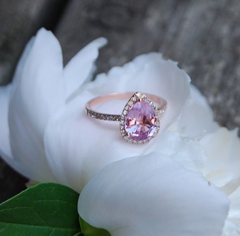 1.9ct Peach pink champagne tear drop sapphire and rose gold diamond engagement ring. $2,150.00, via Etsy. Peach Champagne Sapphire, Colored Sapphires, Peach Sapphire Rings, Pink Sapphire Engagement Ring, Wedding Wishlist, Peach Sapphire Engagement Ring, Pink Sapphire Ring Engagement, Rose Gold Diamond Ring Engagement, Champagne Pink