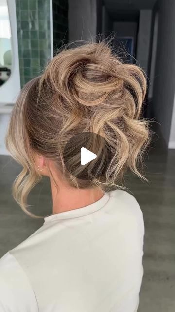 Salons Direct on Instagram: "YOUR HAIR UP INSPO ⚡⁣ ⁣ Watch as the talented @chantellemareehair shows you how to create this effortless, soft high bun on your clients. ⁣ ⁣ She uses the ghd Helios and Soft Curl Tong to prep the hair, available at salonsdirect.com 🙌⁣ ⁣ Don't forget to press the SAVE button & recreate this look for your clients next night out 💎⁣ --⁣ ⁣ #salonsdirect #hairup #updo #updohairstyle #ghd #ghdhelios #ghdsoftcurltong #hairupdo #hairtutorial #hairtutorials #hairstyletutorials" Hairdo Updo Messy, How To Messy Updo Long Hair, Bun Wedding Hairstyles High, Formal Buns For Long Hair, High Messy Bun Updo Wedding, Messy Hair Updo Short Hair, Messy Hair Updo Wedding, Messy Bun For Wedding Guest, Loose Hair Up