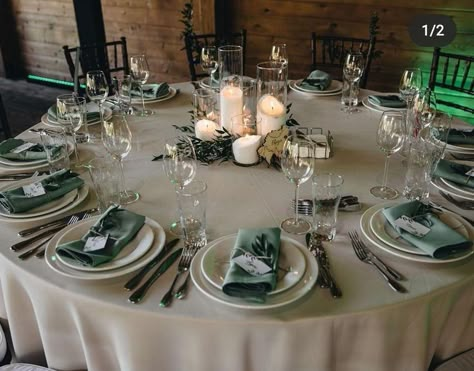 Round Table Wedding Decor Sage Green, White And Sage Table Settings, Sage And White Table Setting, Pastel Green Table Setting, Sage Wedding Reception Decor, Olive Wedding Centerpieces, Sage Green Wedding Round Tables, Olive Green Wedding Table Setting, Family Style Wedding Dinner Table Round